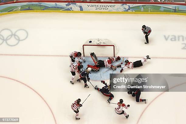 Winter Olympics: Aerial view of Canada goalie Shannon Szabados in action vs USA Monique Lamoureux during Women's Gold Medal Game - Game 20 at Canada...