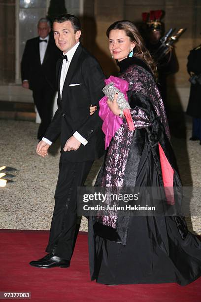 Francois Sarkozy arrives to attend a state dinner honouring visiting Russian President Dmitry Medvedev at the Elysee Palace on March 2, 2010 in...