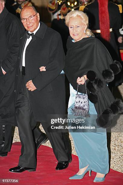 Serge Dassault and his wife arrive to attend a state dinner at Elysee Palace on March 2, 2010 in Paris, France.