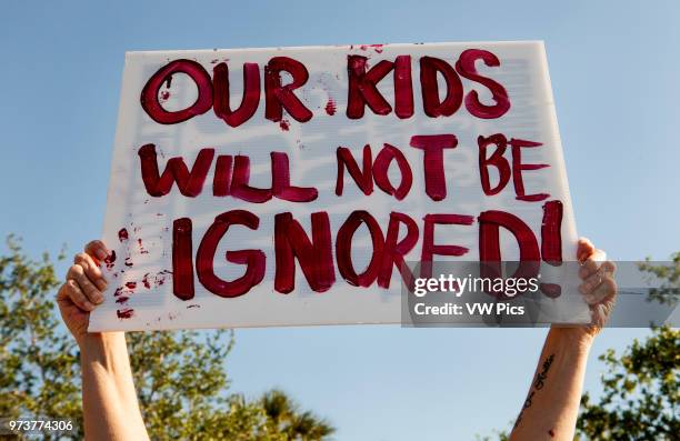 Students from Marjory Stoneman Douglas High School walkout from school honoring the 17 victims killed at the school one month ago on Valentine's Day....