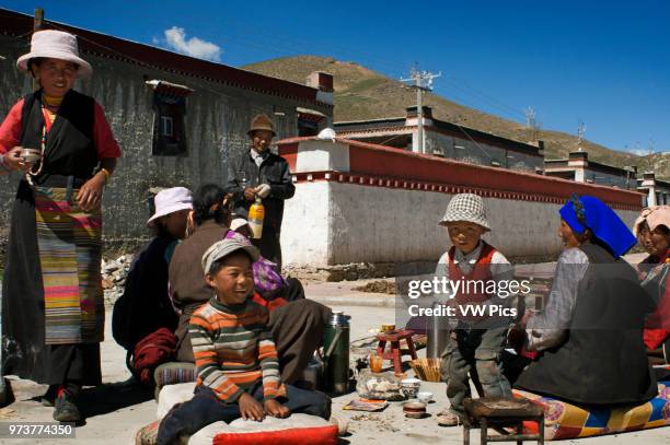 Family celebrates the graduation of a relative in the village of Bainans, located along the road separating Shigatse from Gyantse, Tibet, China.