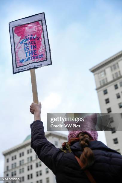 Heather Stahlnecker, of Portland, carries a sign during a rally for women's rights, and against President Donald Trump, on January 20, 2018....