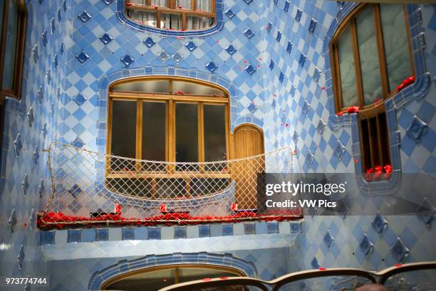 Antoni Gaudi Casa Batllo, UNESCO World Heritage Site, Barcelona, Catalonia, Spain. Sant Jordi is the Patron Saint of Catalonia all is full of roses.