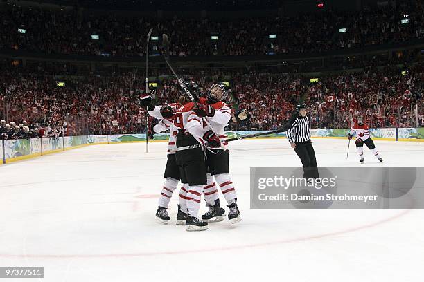 Winter Olympics: Canada Marie-Phillip Poulin victorious after scoring goal with Meghan Agosta vs USA during Women's Gold Medal Game - Game 20 at...