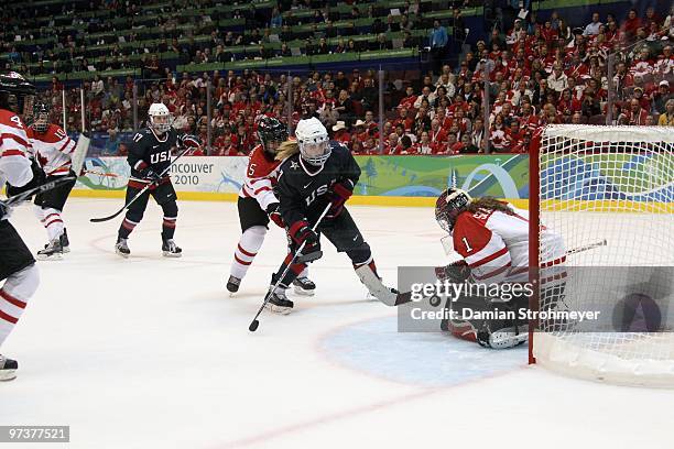 Winter Olympics: Canada goalie Shannon Szabados in action vs USA Monique Lamoureux during Women's Gold Medal Game - Game 20 at Canada Hockey Place....