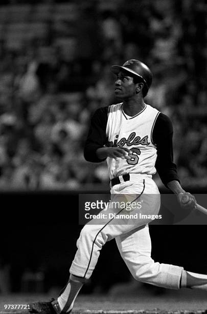 Outfielder Paul Blair of the Baltimore Orioles watches the flight of a ball he's just hit during a game in 1968 at Memorial Stadium in Baltimore,...