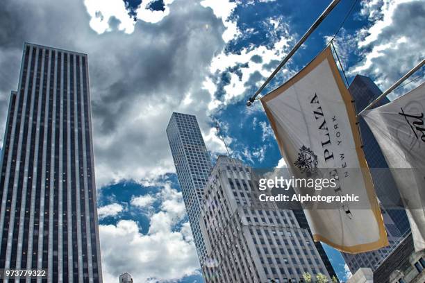 the plaza hotel flag - central park view stock pictures, royalty-free photos & images