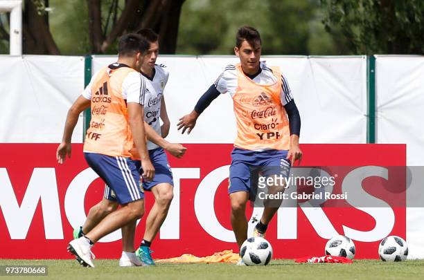 Paulo Dybala of Argentina drives the ball during a training session at Training site at Stadium of Syroyezhkin Sports School on June 12, 2018 in...