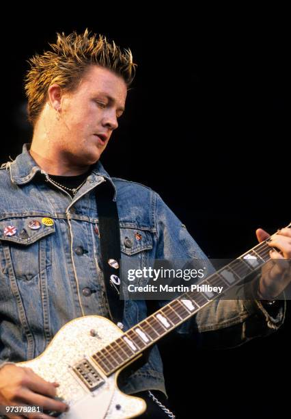 Chris Cheney of The Living End performs at the Big Day Out festival at the Royal Melbourne Showgrounds on January 26, 1999 in Melbourne, Australia.