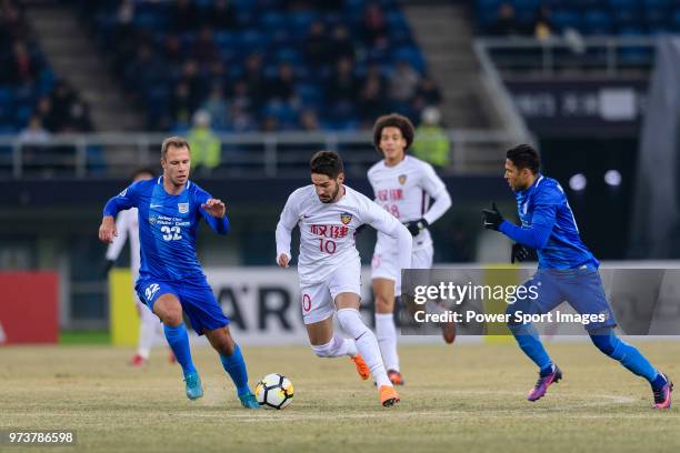 Tianjin Midfielder Alexandre Pato plays against Kitchee Midfielder Krisztian Vadocz during the AFC Champions League 2018 round 1 of Group Stage E...