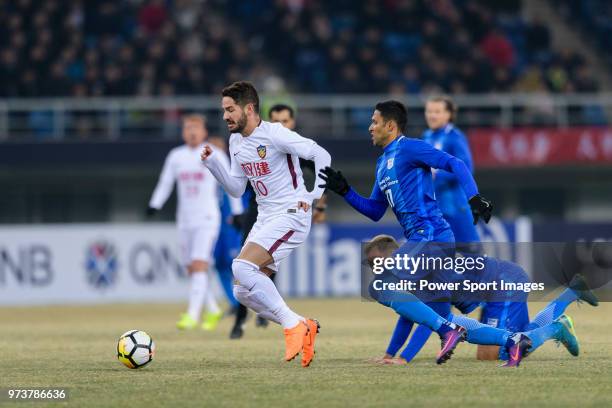 Tianjin Midfielder Alexandre Pato plays against Krisztian Vadocz and Paulinho Carreiro of Kitchee during the AFC Champions League 2018 round 1 of...