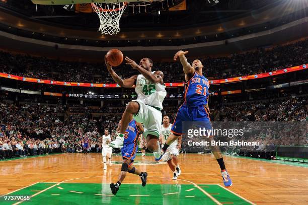 Tony Allen of the Boston Celtics goes to the basket against Wilson Chandler of the New York Knicks during the game on February 23, 2010 at TD...