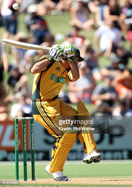 Ricky Ponting of Australia ducks under a delivery from Shane Bond of New Zealand during the First One Day International match between New Zealand and...