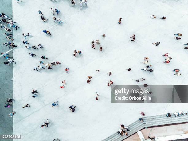 high angle view of people on street - grupo grande de pessoas imagens e fotografias de stock