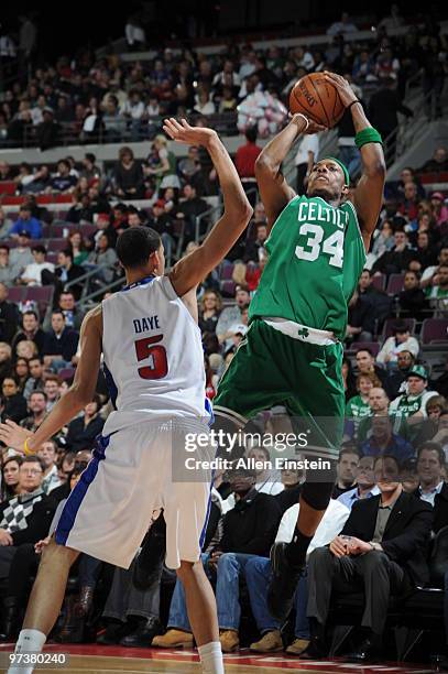 Paul Pierce of the Boston Celtics takes a shot attempt against Austin Daye of the Detroit Pistons in a game at the Palace of Auburn Hills on March 2,...