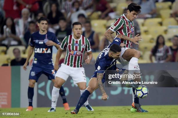 Pedro Santos of Fluminense struggles for the ball with Alison of Santos during the match between Fluminense and Santos as part of Brasileirao Series...