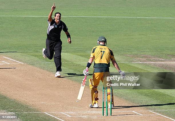 Daryl Tuffey of New Zealand celebrates bowling Cameron White of Australia during the First One Day International match between New Zealand and...