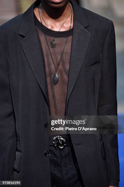 Model, fashion detail, walks the runway at the Roberto Cavalli show during the 94th Pitti Immagine Uomo on June 13, 2018 in Florence, Italy.