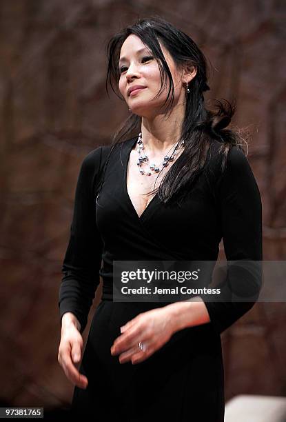 Actress Lucy Liu takes a bow following her performance as a new cast member of the broadway production of "God Of Carnage" at The Bernard B. Jacobs...