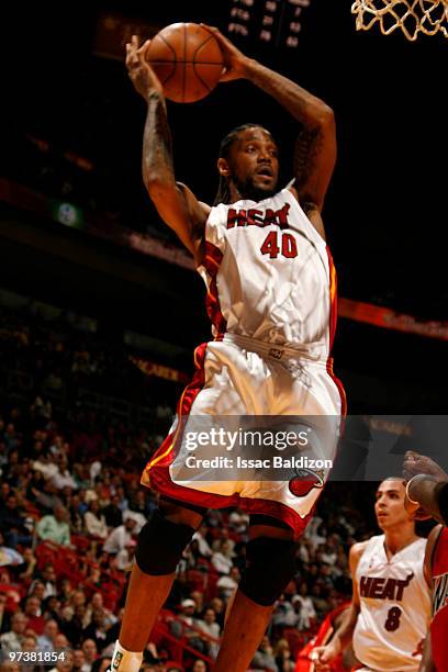 Udonis Haslem of the Miami Heat grabs a rebound against the Golden State Warriors on March 2, 2010 at American Airlines Arena in Miami, Florida. NOTE...