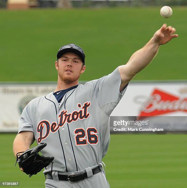 Brennan Boesch of the Detroit Tigers throws against Florida Southern College during a spring training game at Joker Marchant Stadium on March 2, 2010...