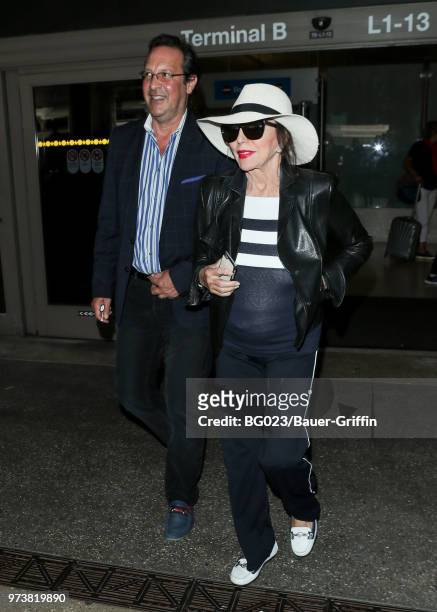 Joan Collins and her husband, Percy Gibson are seen on June 13, 2018 in Los Angeles, California.