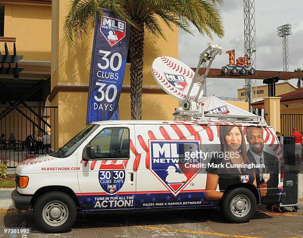 Network 30 clubs in 30 days van and signage is displayed outside of Joker Marchant Stadium before the spring training game between the Detroit Tigers...