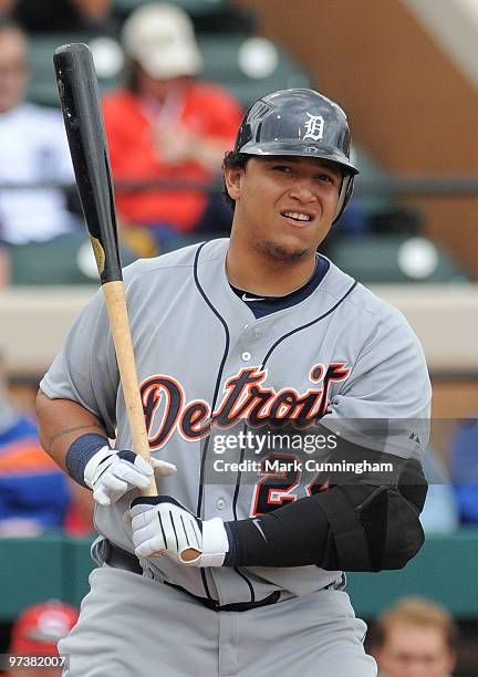 Miguel Cabrera of the Detroit Tigers looks on against Florida Southern College during a spring training game at Joker Marchant Stadium on March 2,...