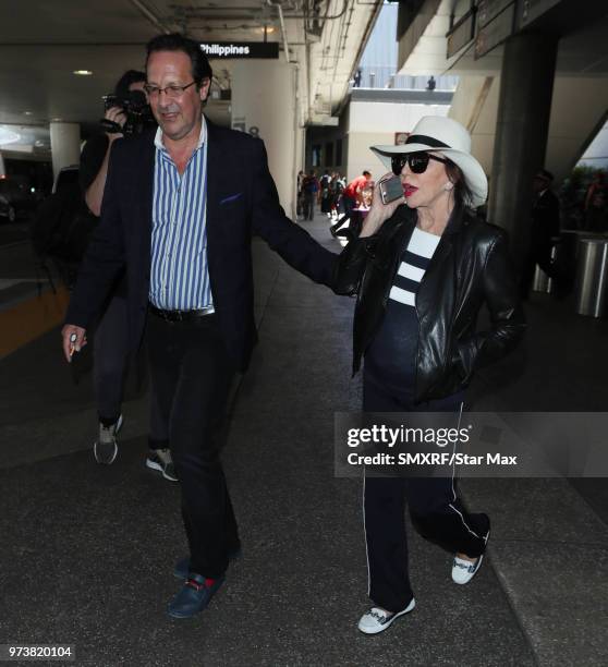 Percy Gibson and Joan Collins are seen on June 13, 2018 in Los Angeles, CA.