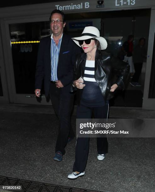 Percy Gibson and Joan Collins are seen on June 13, 2018 in Los Angeles, CA.