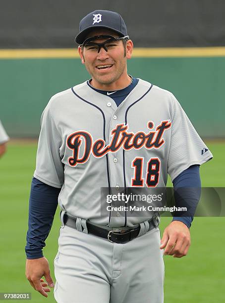 Johnny Damon of the Detroit Tigers looks on against Florida Southern College during a spring training game at Joker Marchant Stadium on March 2, 2010...