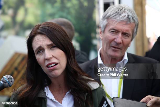 New Zealand Prime Minister Jacinda Ardern speaks as Minister of Agriculture Damien O'Connor looks on during the Mystery Creek Fieldays on June 14,...