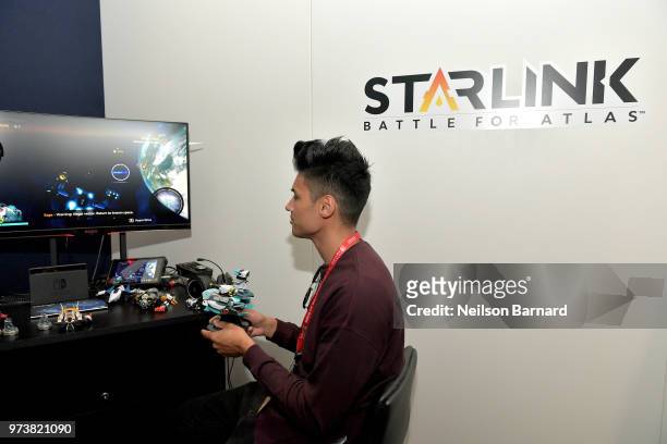 Siva Kaneswaran of The Wanted plays Starlink: Battle for Atlas during E3 2018 at Los Angeles Convention Center on June 13, 2018 in Los Angeles,...