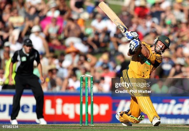 Michael Hussey of Australia is bowled by Shane Bond of New Zealand during the First One Day International match between New Zealand and Australia at...