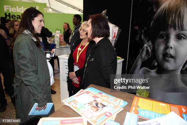 New Zealand Prime Minister Jacinda Ardern looks over the Plunket stall during a walkabout at the Mystery Creek Fieldays on June 14, 2018 in Hamilton,...