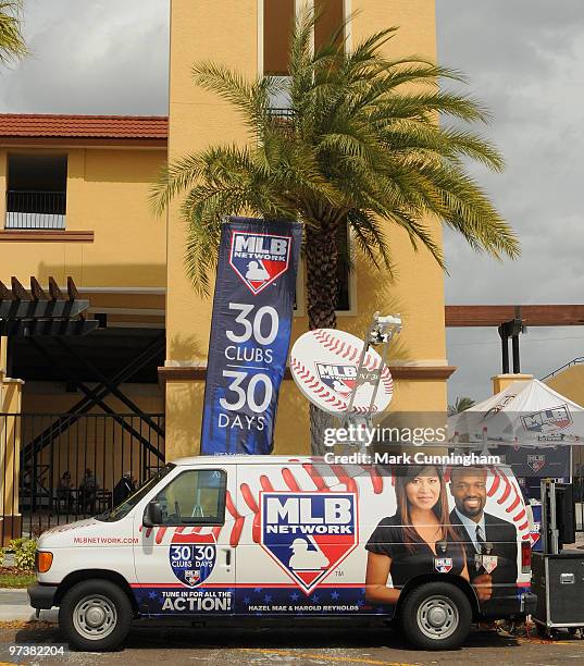 Network 30 clubs in 30 days van and signage is displayed outside of Joker Marchant Stadium before the spring training game between the Detroit Tigers...