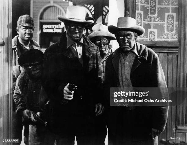 John Wayne on the set of the movie 'The Spoilers' in 1953 in the Yukon Territory, Canada.