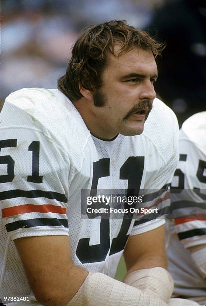 S: Linebacker Dick Butkus of the Chicago Bears watching the action from the bench against the Atlanta Falcons circa 1970's during an NFL football...