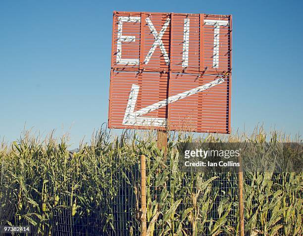 exit sign - corn maze stock-fotos und bilder