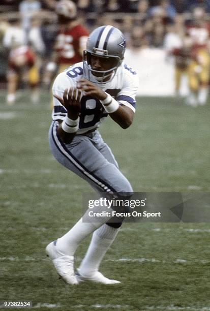 S: Wide Receiver Drew Pearson of the Dallas Cowboys catching pass in pre game warm-up before an NFL football game circa 1980's against the Washington...