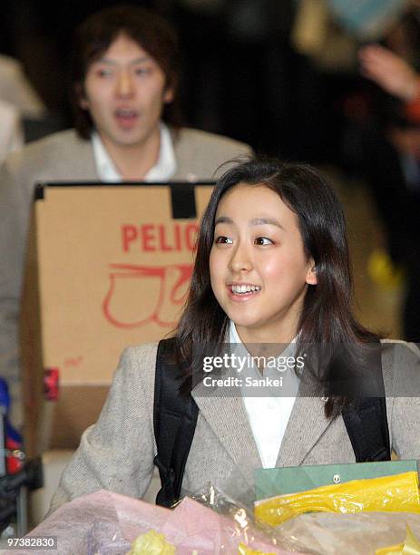 Mao Asada is seen upon arrival at Narita International Airport on March 2, 2010 in Narita, Chiba, Japan.