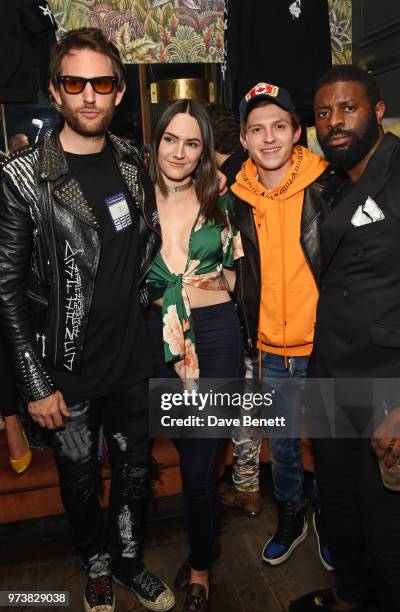 Marc Jacques Burton, guest, Tom Holland and Jay Udo-Udoma attend the MJB x YOTA fashion capsule party supported by Ciroc who have designed MJB x YOTA...