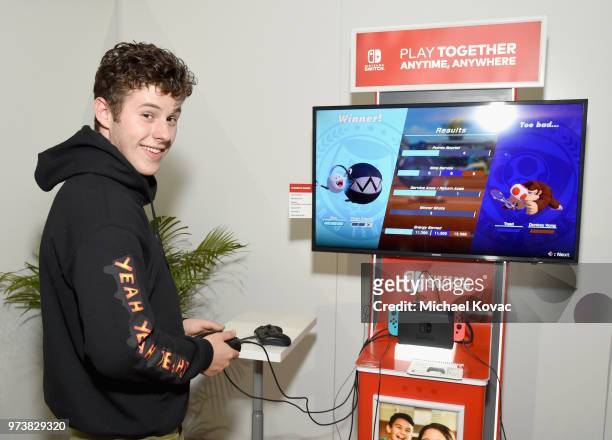 Nolan Gould stopped by the Nintendo booth at the 2018 E3 Gaming Convention for some hands-on time with the Mario Tennis Aces game for the Nintendo...