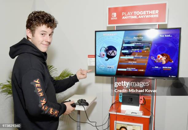 Nolan Gould stopped by the Nintendo booth at the 2018 E3 Gaming Convention for some hands-on time with the Mario Tennis Aces game for the Nintendo...