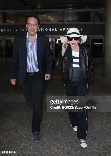 Joan Collins and her husband, Percy Gibson are seen on June 13, 2018 in Los Angeles, California.