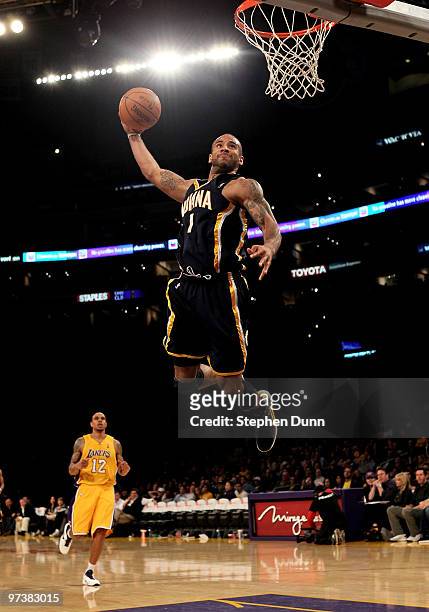 Dahntay Jones of the Indiana Pacers goes up for a breakaway dunk against the Los Angeles Lakers on March 2, 2010 at Staples Center in Los Angeles,...