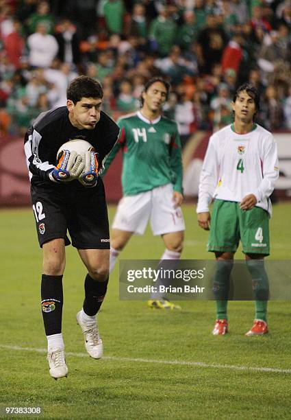 Goalkeeper Carlos Lampe of Bolivia stops a shot during a friendly match against Mexico in preparation for the 2010 FIFA World Cup on February 24,...