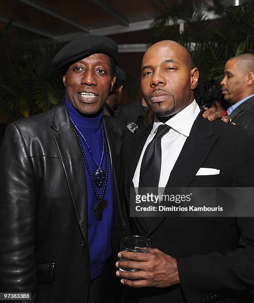 Actor Wesley Snipes and director Antoine Fuqua attend the after party for the premiere of "Brooklyn's Finest" at on March 2, 2010 in New York City.