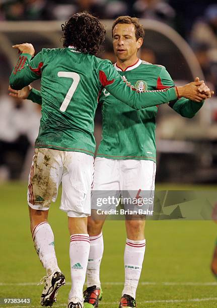 Braulio Luna and Gerardo Torrado of Mexico celebrate after scoring against Bolivia during a friendly match in preparation for the 2010 FIFA World Cup...
