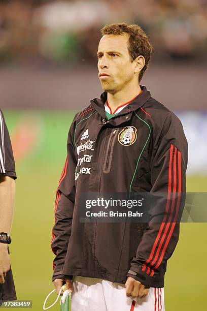 Gerardo Torrado of Mexico stands for the national anthem before a friendly match against Bolivia in preparation for the 2010 FIFA World Cup on...